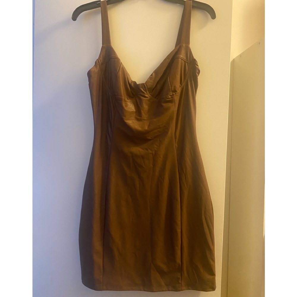 Naked wardrobe leather dress